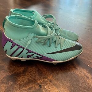 Nike Turquoise Soccer Cleats with Purple Heel and Black Swoosh